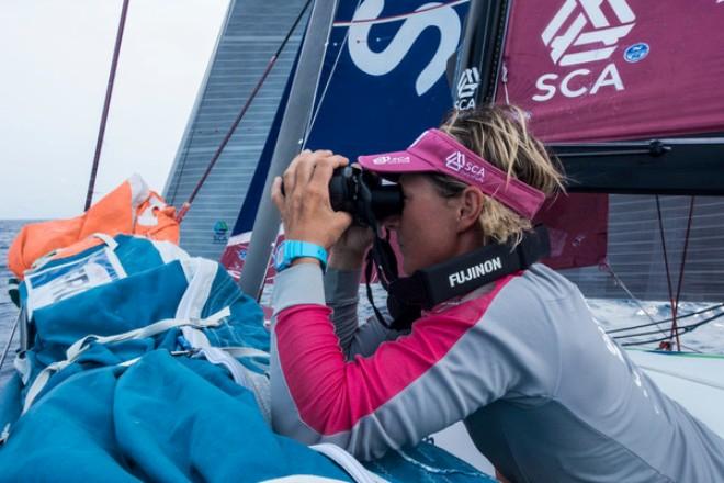 Team SCA - Abby Ehler searching for Brunel who turned up on our AIS today - Leg 4 to Auckland -  Volvo Ocean Race 2015 © Anna-Lena Elled/Team SCA